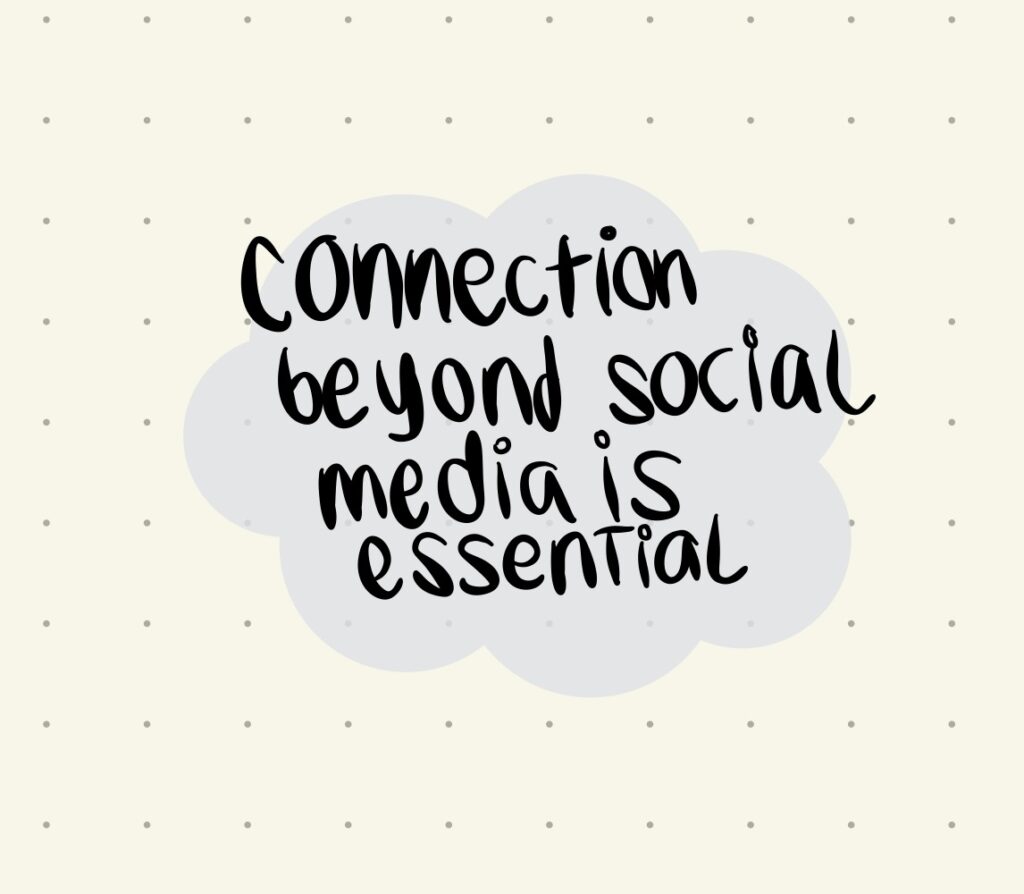 handwritten text on blue cloud on sepia-toned dotted paper reads:"connection beyond social media is essential"